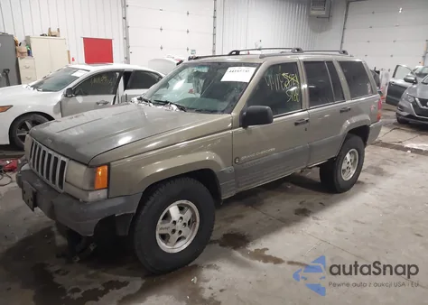 1997 Jeep Grand Cherokee Laredo/Tsi из США, поврежденный, VIN 1J4GZ58S3VC777456